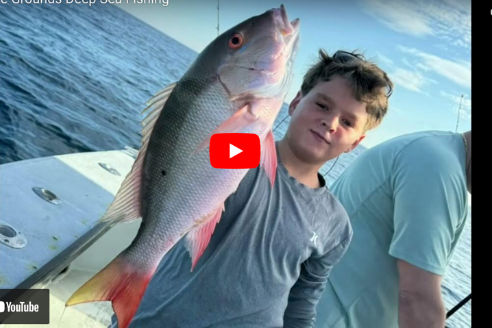Middle Grounds Video Post a man holding a fish